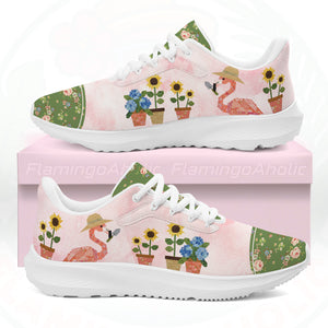 A pair of ultra-light cloud walking shoes featuring a watercolor-style flamingo wearing a straw hat among potted sunflowers and hydrangeas.