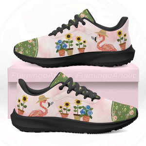 A pair of ultra-light cloud walking shoes featuring a watercolor-style flamingo wearing a straw hat among potted sunflowers and hydrangeas.