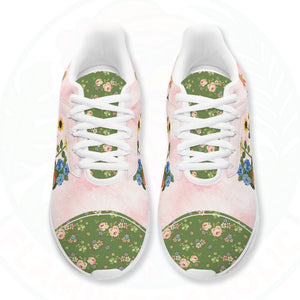 A pair of ultra-light cloud walking shoes featuring a watercolor-style flamingo wearing a straw hat among potted sunflowers and hydrangeas.