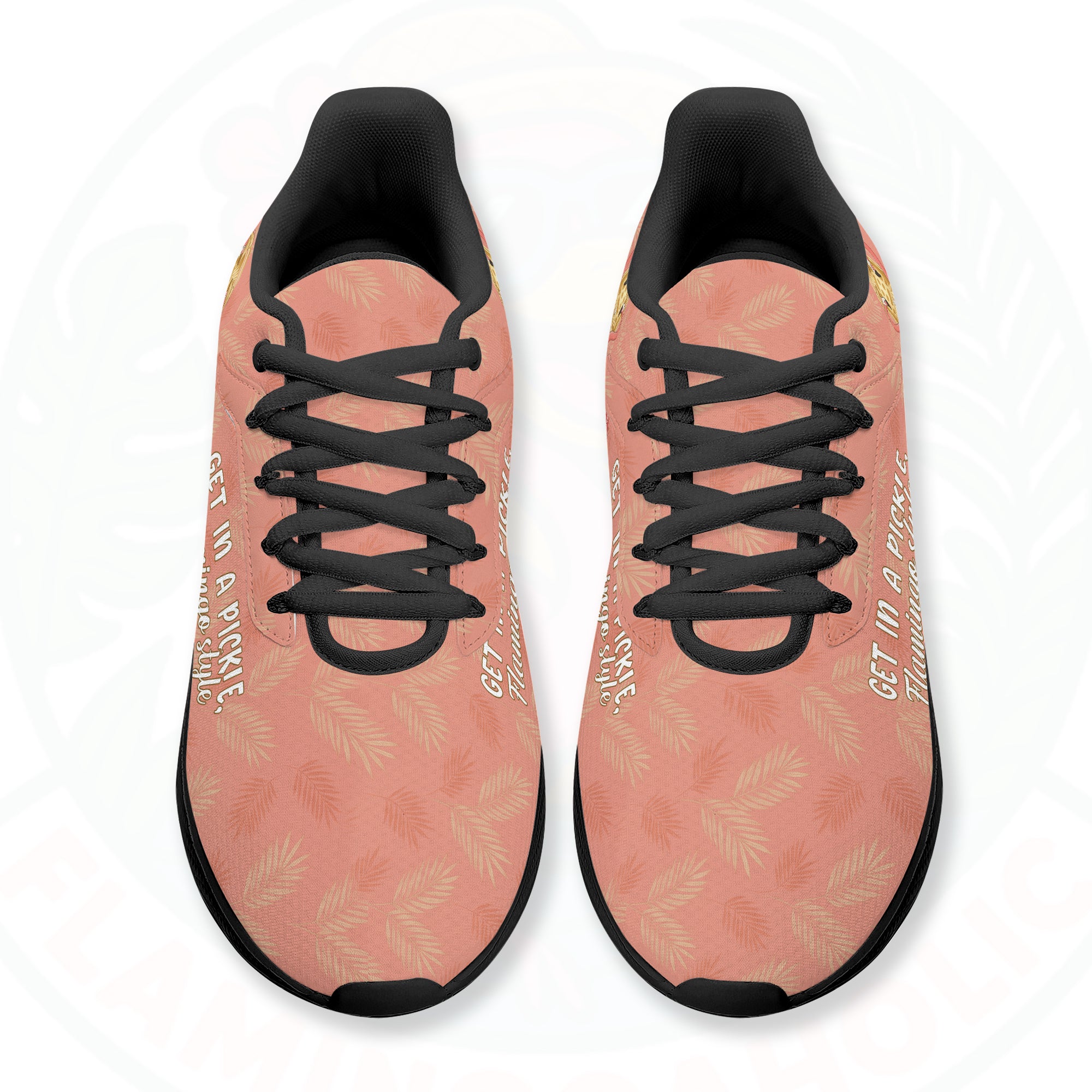 Coral pink cloud sneaker featuring tropical palm print, two flamingos in sunhats, and the text "GET IN A PICKLE, Flamingo style."