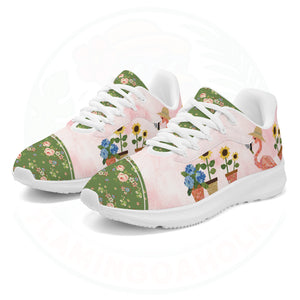 A pair of ultra-light cloud walking shoes featuring a watercolor-style flamingo wearing a straw hat among potted sunflowers and hydrangeas.