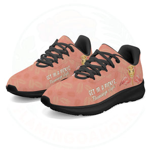 Coral pink cloud sneaker featuring tropical palm print, two flamingos in sunhats, and the text "GET IN A PICKLE, Flamingo style."