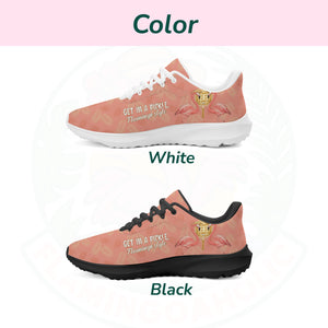 Coral pink cloud sneaker featuring tropical palm print, two flamingos in sunhats, and the text "GET IN A PICKLE, Flamingo style."